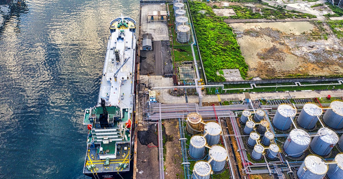 Which tank has the most rebound naturally? - Aerial View of Cargo Ship on Dock
