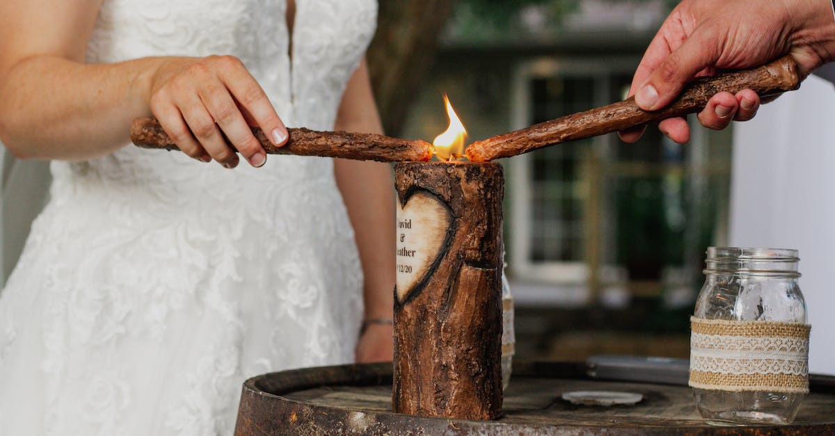 Which things to consider for decisions about marriage in Fire Emblem:Awakening? - Crop newlyweds lighting candle during ceremony Which things to consider for decisions about marriage in Fire Emblem:Awakening? - Crop newlyweds lighting candle during ceremony