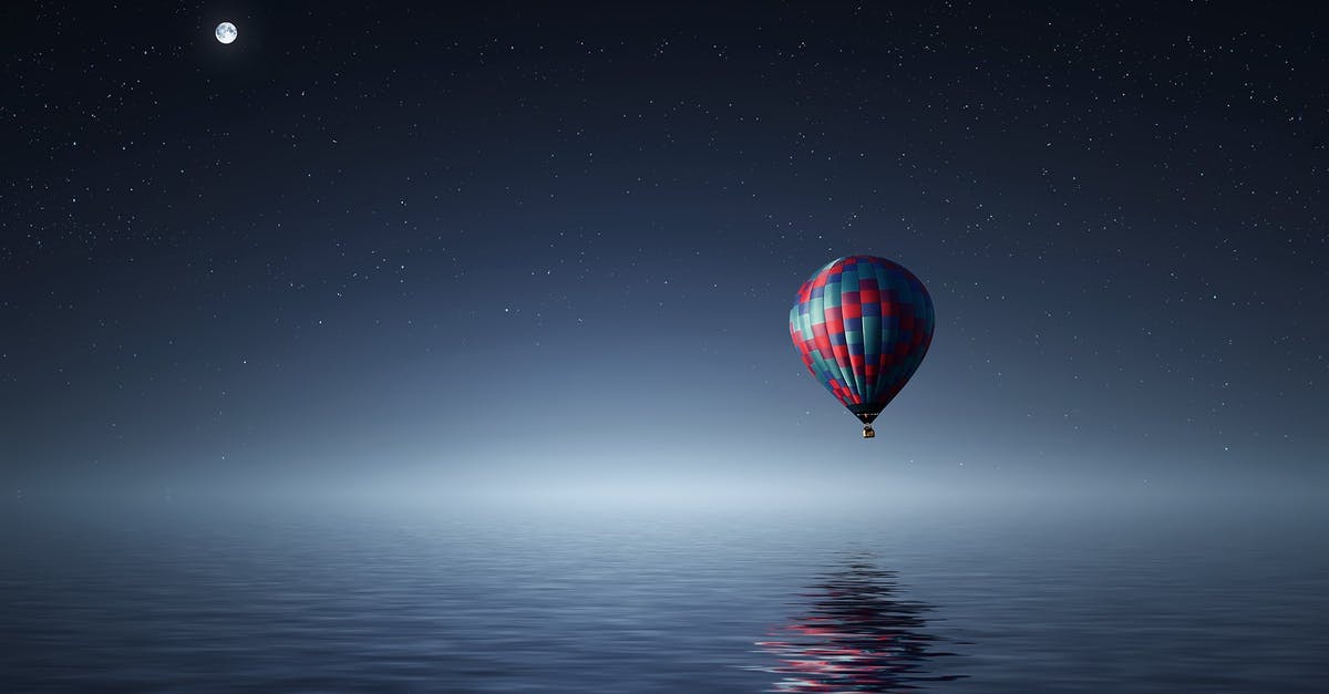 Which UFO flight computers will I recover? - Red and Blue Hot Air Balloon Floating on Air on Body of Water during Night Time