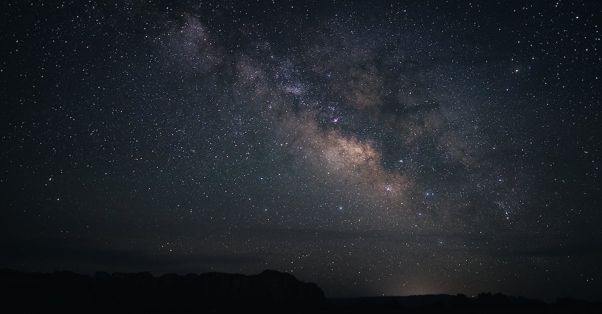 Which version of Rogue Galaxy (PS2) is the one that doesn't freeze? - Silhouette of Mountain Under Starry Night