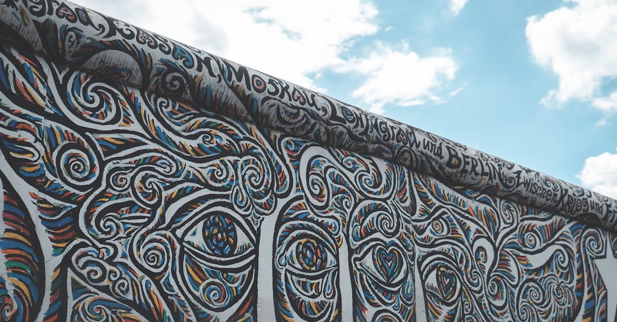 Which was the true release date of the original Final Fantasy game? - Abstract graffiti on wall on street