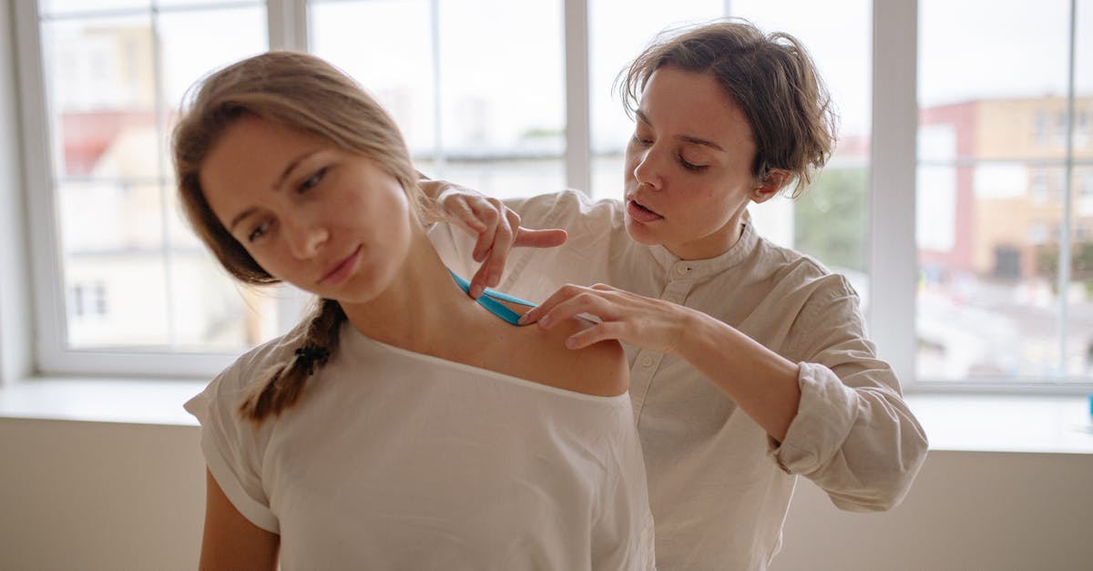 Which Windows Apps are required to run Windows Games (XBox crossplay) - Woman in White Crew Neck T-shirt Holding Blue Plastic Bottle
