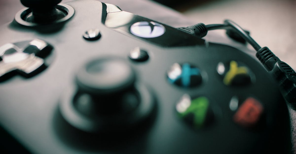 Which Xbox games can be played on the Xbox 360? - Closeup Photography Xbox One Black Controller
