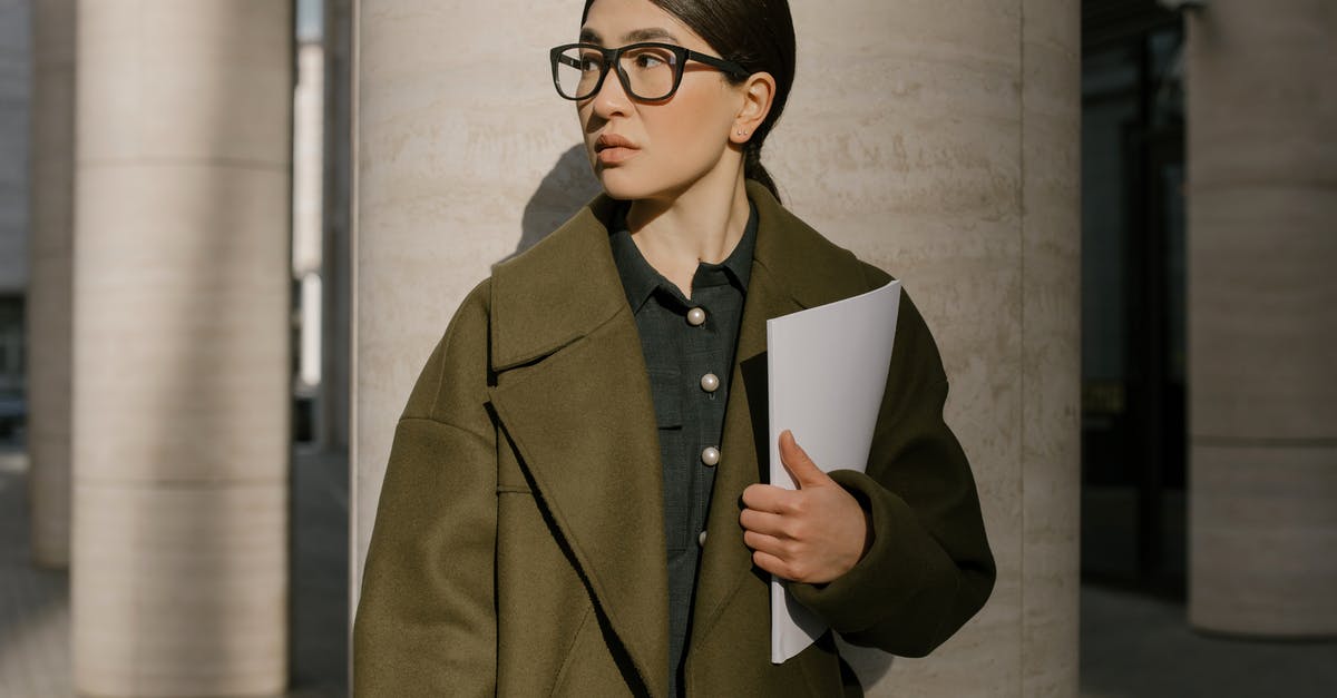 Who Are The Highest Potential Players On Career Mode? - Woman in Brown Coat Holding White Paper