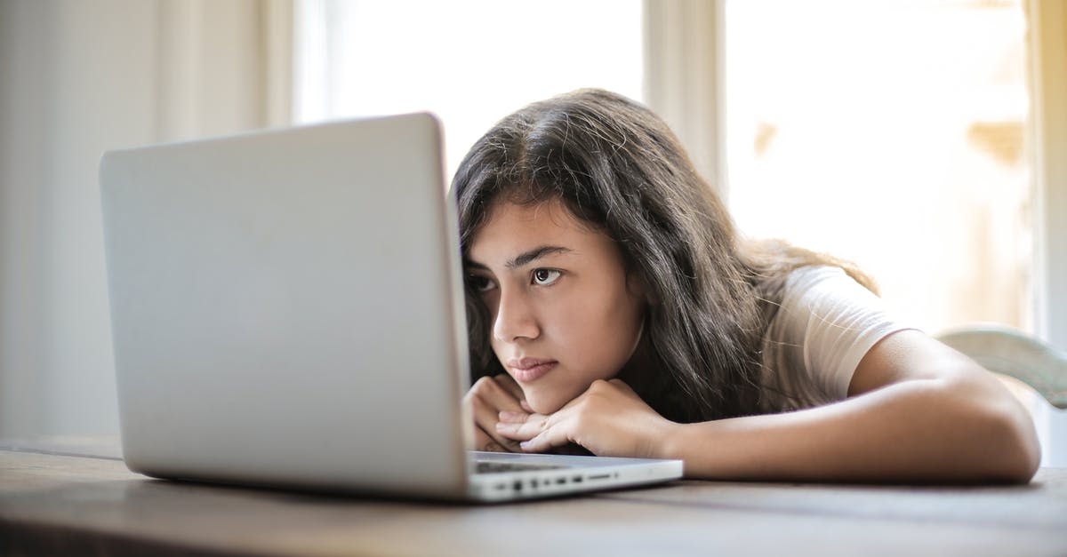 Who does the Monitor think the Master Chief is? - Young woman using laptop at home Who does the Monitor think the Master Chief is? - Young woman using laptop at home