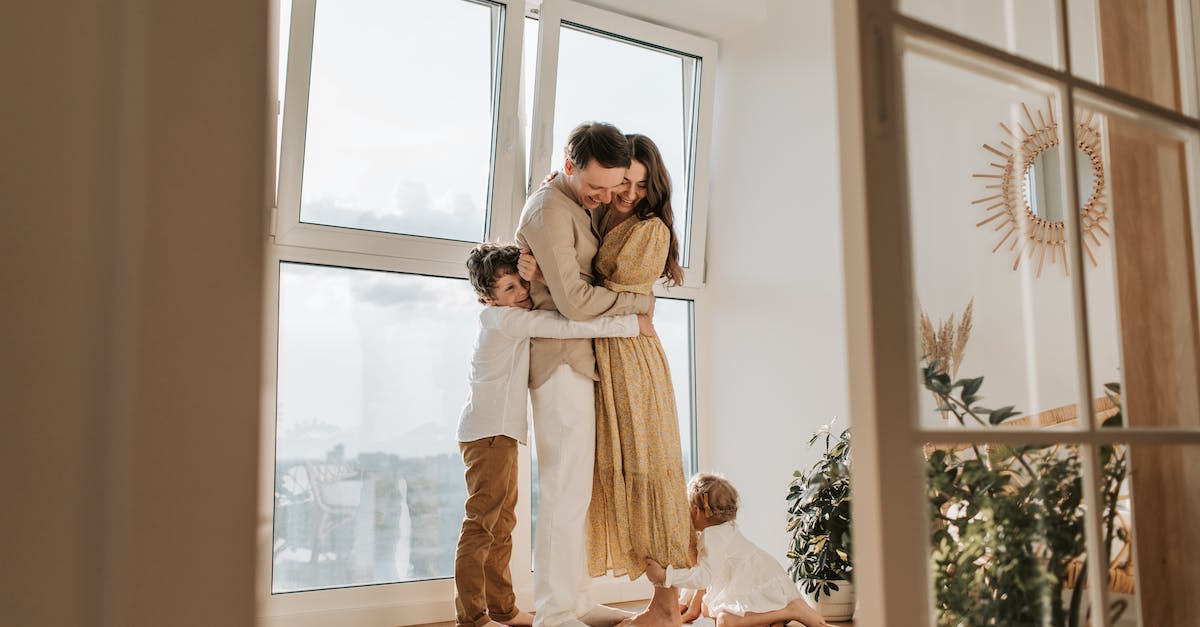Who is Angel's mother? - Happy Family Hugging