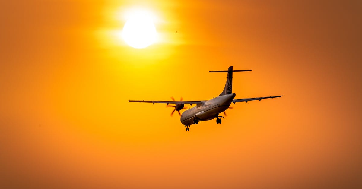 Who is flying the vertibirds? - White and Red Airplane Flying during Sunset