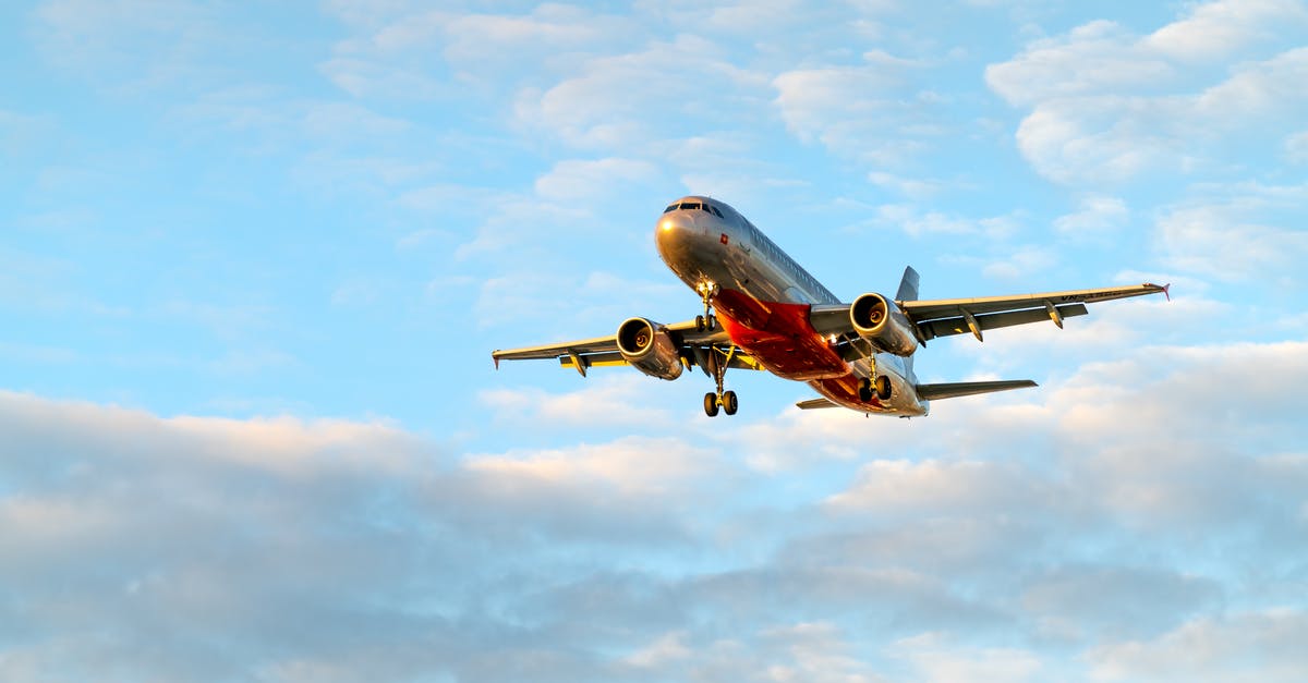 Who is flying the vertibirds? - White and Red Airplane Under Blue Sky