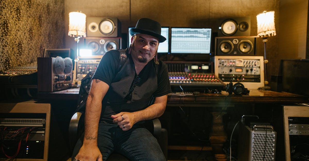 Who is the man shown in the last cutscene after beating Diablo? - Man in Black Polo Shirt Sitting on Black Office Rolling Chair