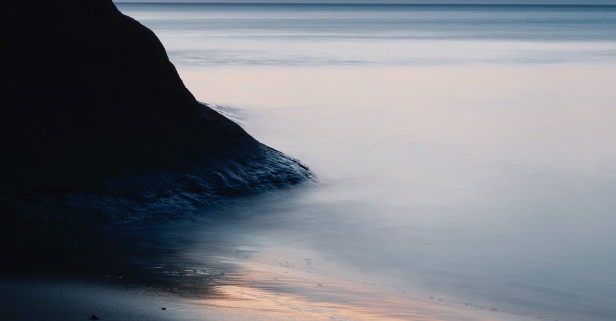 Who is the Mysterious Stranger and how to find him? [duplicate] - Body of Water Near Mountain