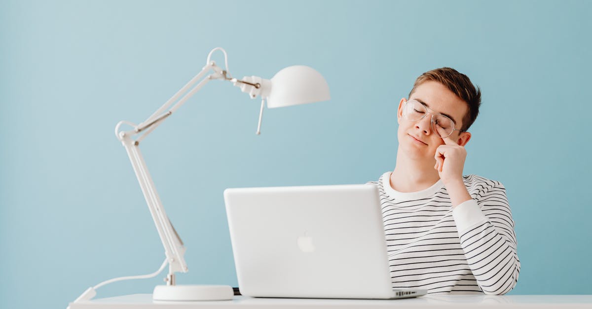 Who is this guy? - Tired Guy Sitting on Laptop Overwhelmed with Computer Work