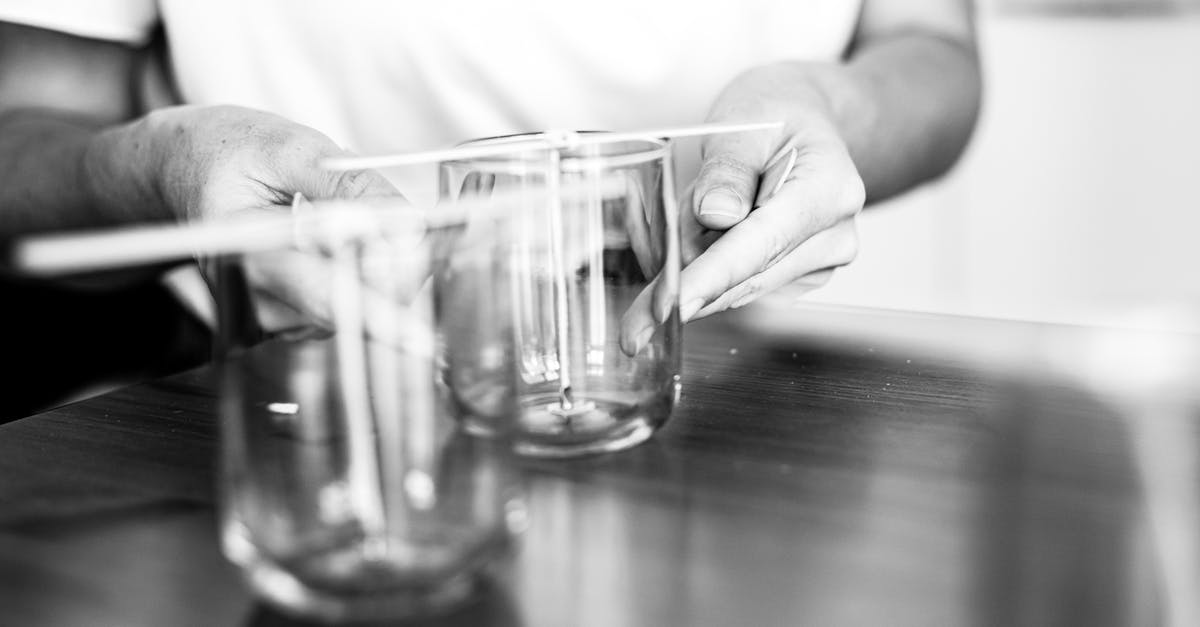 Who lost to Glass Joe? - Hands Holding Glass in Black and White Who lost to Glass Joe? - Hands Holding Glass in Black and White