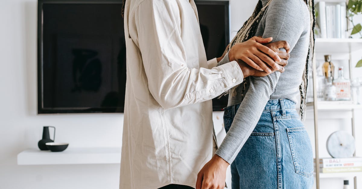 Whoa, A Bad Relationship - Side view of crop unrecognizable abuser hurting girlfriend during misunderstanding in relationship at home Whoa, A Bad Relationship - Side view of crop unrecognizable abuser hurting girlfriend during misunderstanding in relationship at home