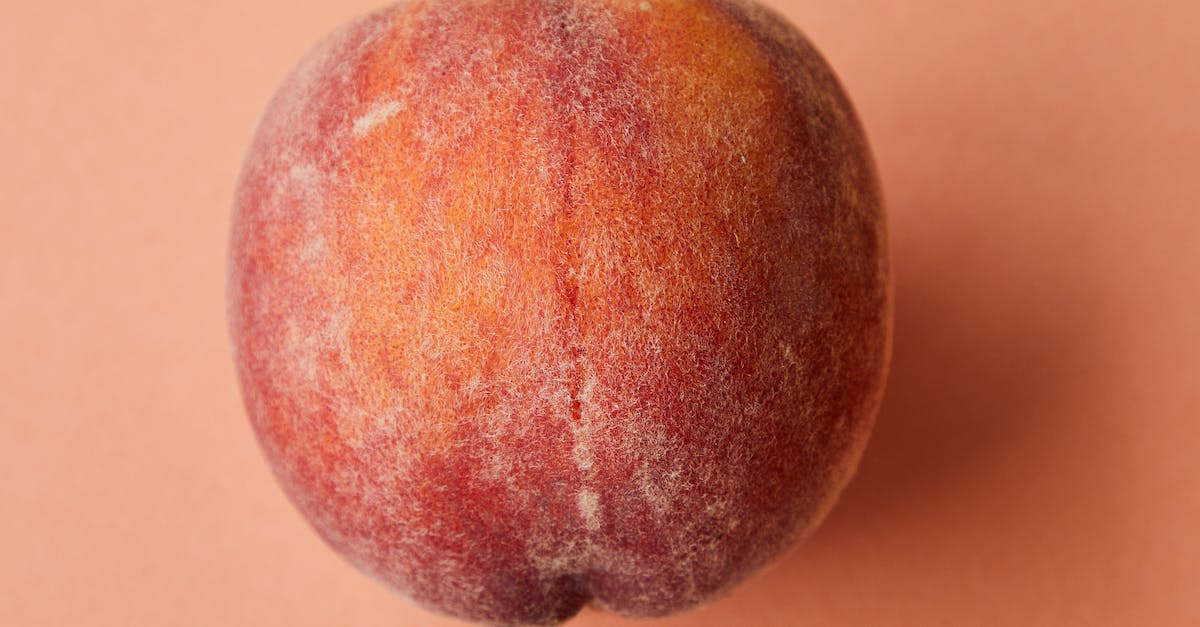 Why am I suddenly hostile to the whole world? - Fresh juicy pink peach on pink surface