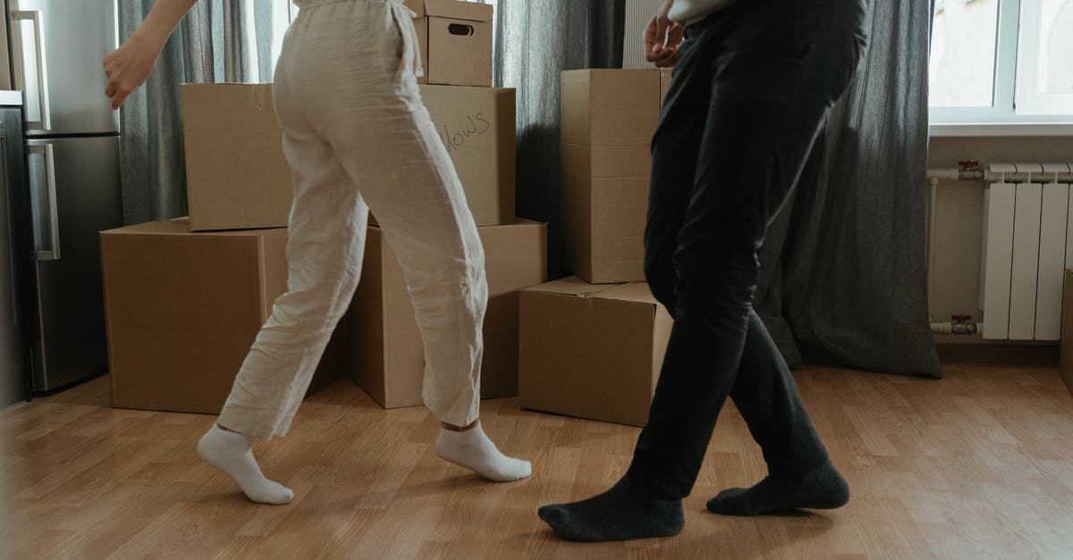 Why are my dupes tiding stuff into storage bins far away instead of nearby? - Man in White T-shirt and Black Pants Holding Woman in White T-shirt Why are my dupes tiding stuff into storage bins far away instead of nearby? - Man in White T-shirt and Black Pants Holding Woman in White T-shirt