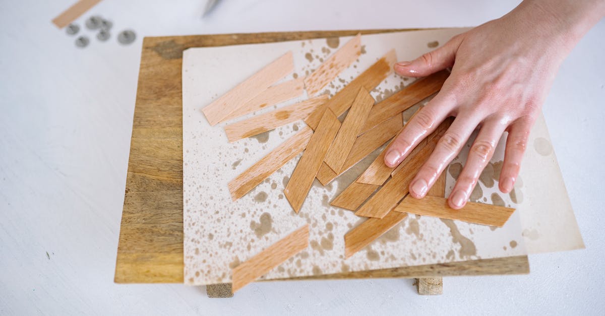 Why are my rotational controls also applying to another craft in the vicinity of mine? [closed] - Close-Up Photograph of a Person's Hand Applying Oil to Wooden Wicks