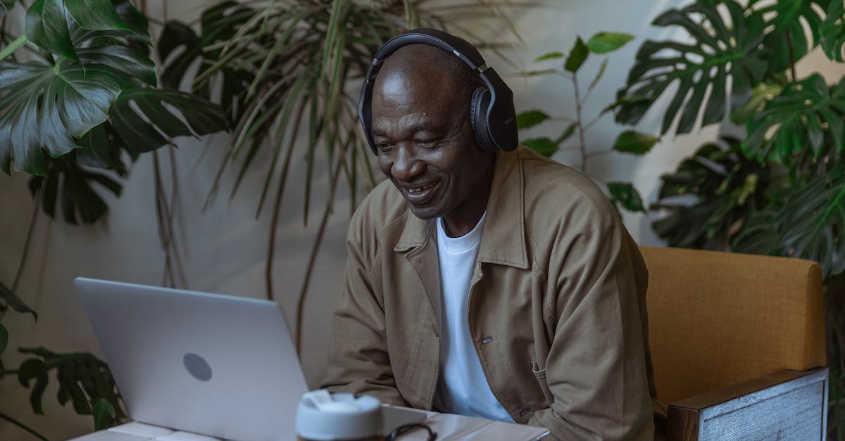 Why are my Wii Remotes being laggy and choppy? - Photo of an Old Man Happily Smiles in Front of Laptop Why are my Wii Remotes being laggy and choppy? - Photo of an Old Man Happily Smiles in Front of Laptop