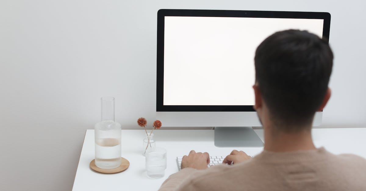 Why are Online parallel quests not clearing? - Back view of unrecognizable male freelancer sitting at table with glass of water while typing on keyboard and looking at screen of computer Why are Online parallel quests not clearing? - Back view of unrecognizable male freelancer sitting at table with glass of water while typing on keyboard and looking at screen of computer
