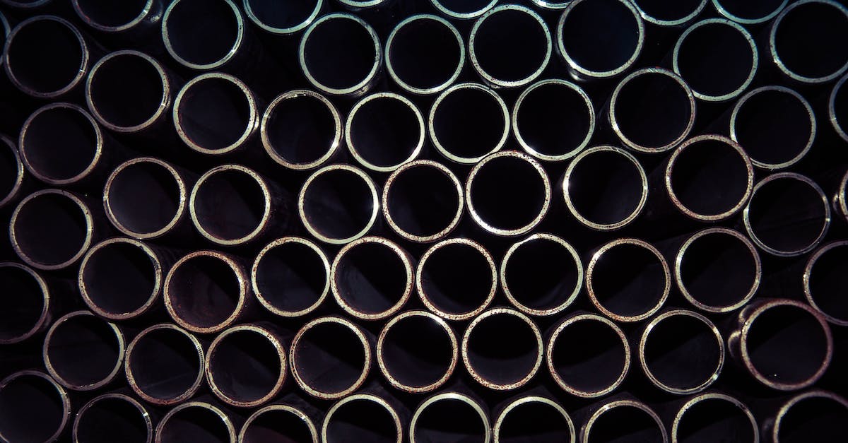 Why are pipes rusting and bursting - Close Up Photo of Gray Metal Pipes