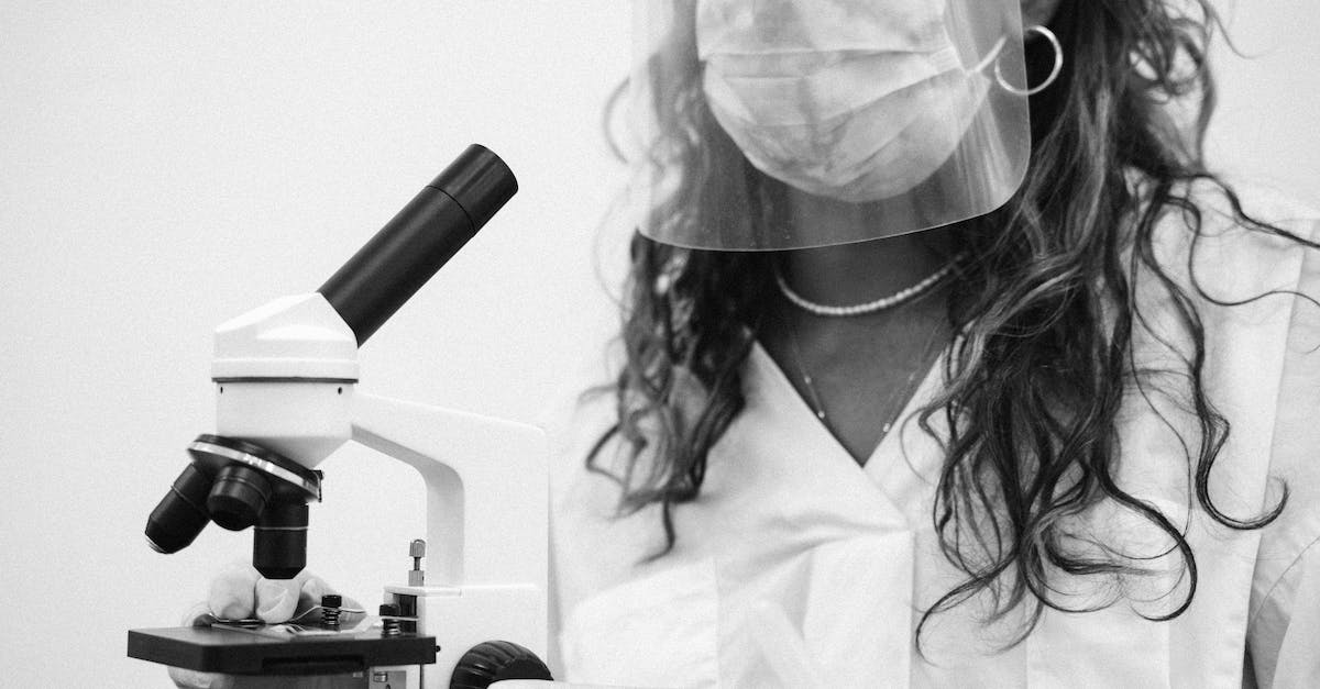 Why are shields always the last upgrade researched by the pros? - Grayscale Photo of a Woman in Face Mask and Face Shield While Holding a Microscope Why are shields always the last upgrade researched by the pros? - Grayscale Photo of a Woman in Face Mask and Face Shield While Holding a Microscope