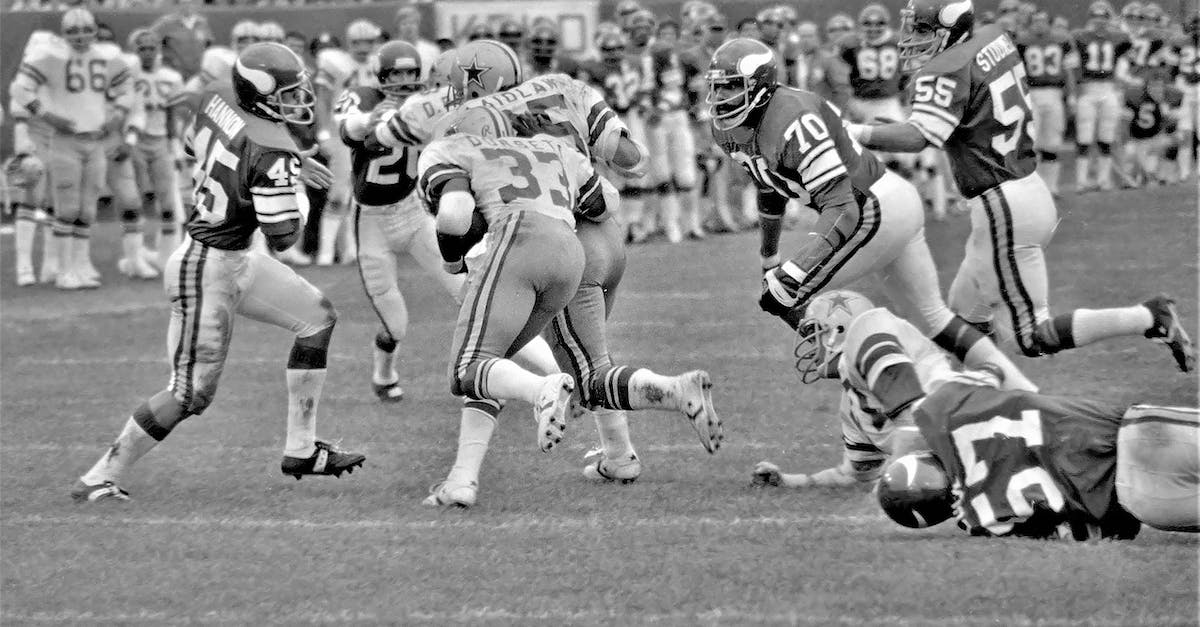 Why are some players not auctionable in Madden 2015? - Grayscale Photo of Football Players on Field Why are some players not auctionable in Madden 2015? - Grayscale Photo of Football Players on Field