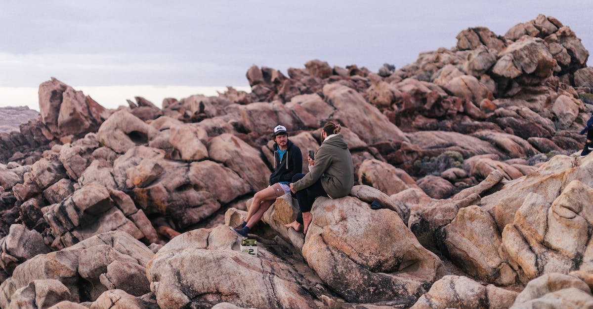 Why are the matchups in Clash of Clans so uneven at times? - Unrecognizable couple of tourists resting on rocks Why are the matchups in Clash of Clans so uneven at times? - Unrecognizable couple of tourists resting on rocks