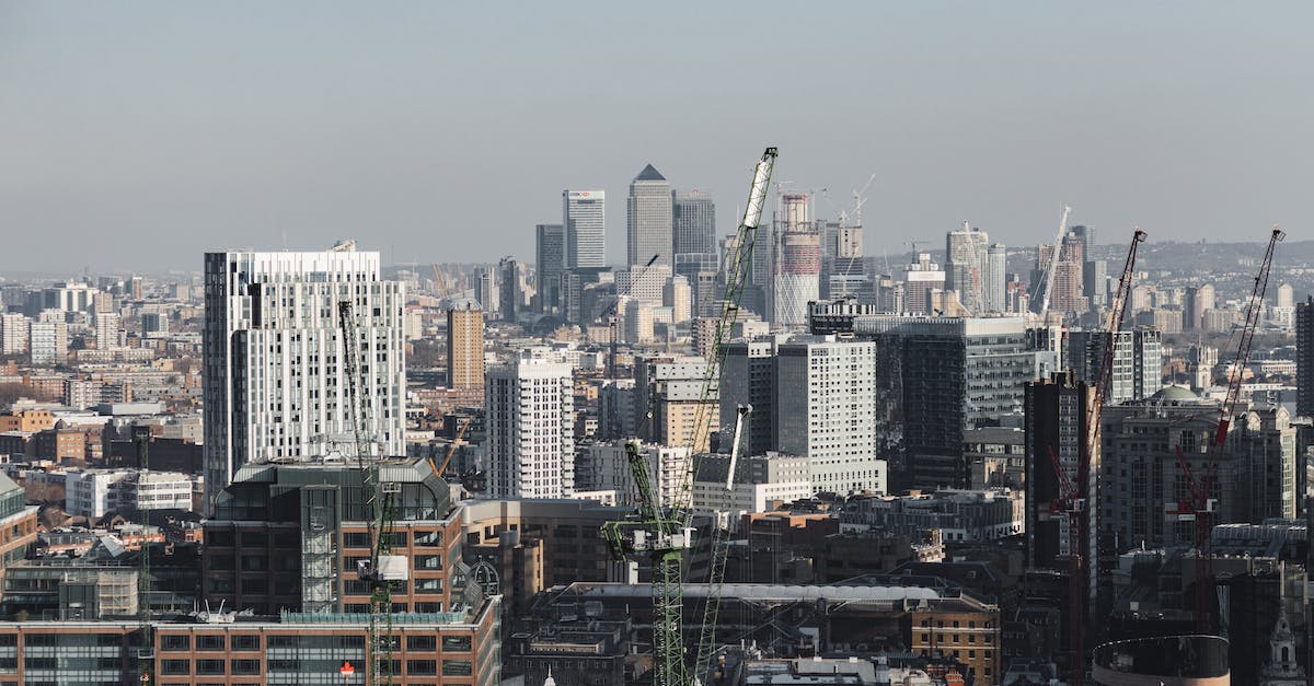 Why aren't any buildings coming up on my break-out Industrial area despite having demand in Cities: Skylines - Scenic cityscape of London district with contemporary multistory buildings and crane towers under cloudy sky in daylight