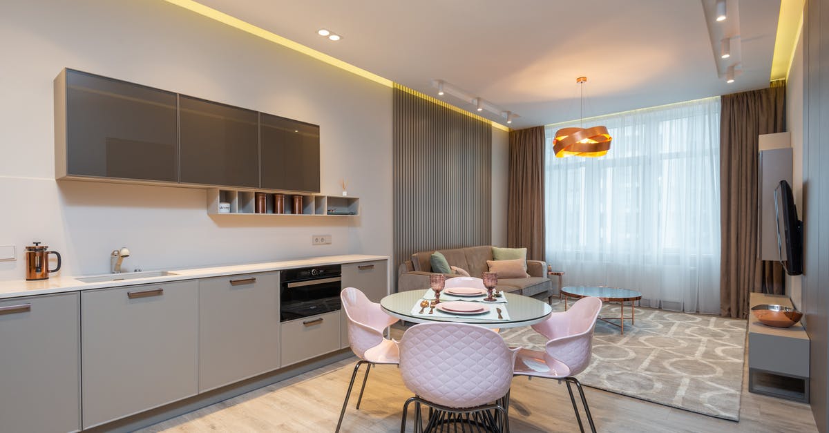 Why aren't my residential zones occupied? - Modern living room with cozy sofa near stylish kitchen zone and round glass dining table Why aren't my residential zones occupied? - Modern living room with cozy sofa near stylish kitchen zone and round glass dining table