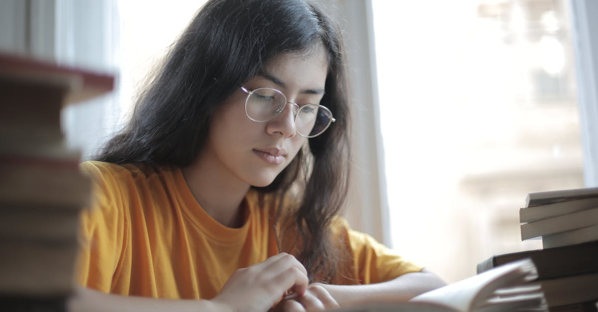 Why can't I access the search bar in NEI? - Low angle of diligent ethnic female student wearing casual t shirt and eyeglasses sitting at table with stacks of books and preparing for exam Why can't I access the search bar in NEI? - Low angle of diligent ethnic female student wearing casual t shirt and eyeglasses sitting at table with stacks of books and preparing for exam