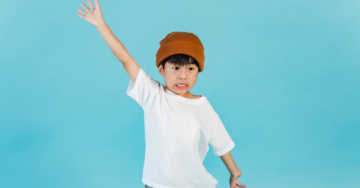Why can't I adopt kids despite already having killed Grelod the Kind? - Astonished stylish Asian boy wearing hat and white t shirt looking away while standing with outstretched arms in light studio Why can't I adopt kids despite already having killed Grelod the Kind? - Astonished stylish Asian boy wearing hat and white t shirt looking away while standing with outstretched arms in light studio