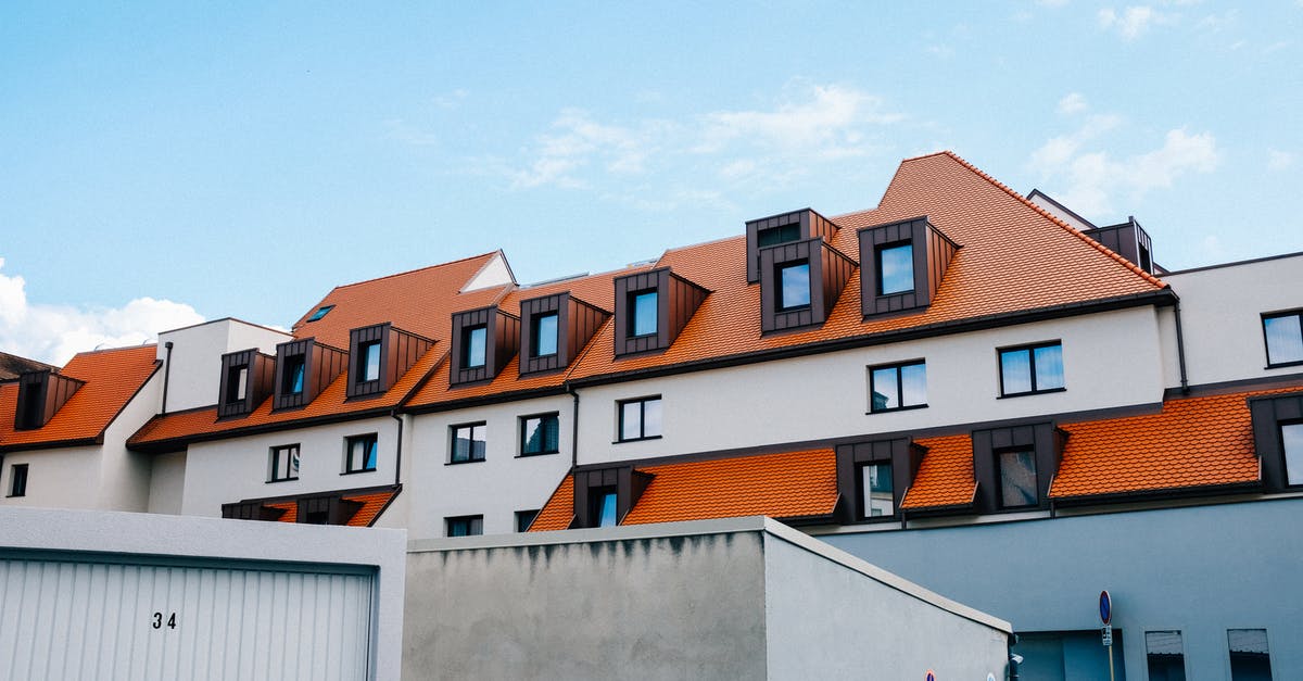 Why can't I build anything on these tiles? - Facade of building with windows on roof Why can't I build anything on these tiles? - Facade of building with windows on roof