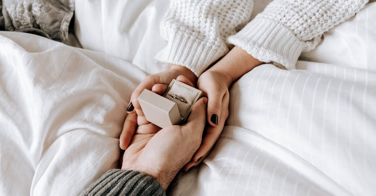 Why can't I give Yonah a pumpkin? - Crop faceless man making proposal and presenting ring to girlfriend Why can't I give Yonah a pumpkin? - Crop faceless man making proposal and presenting ring to girlfriend