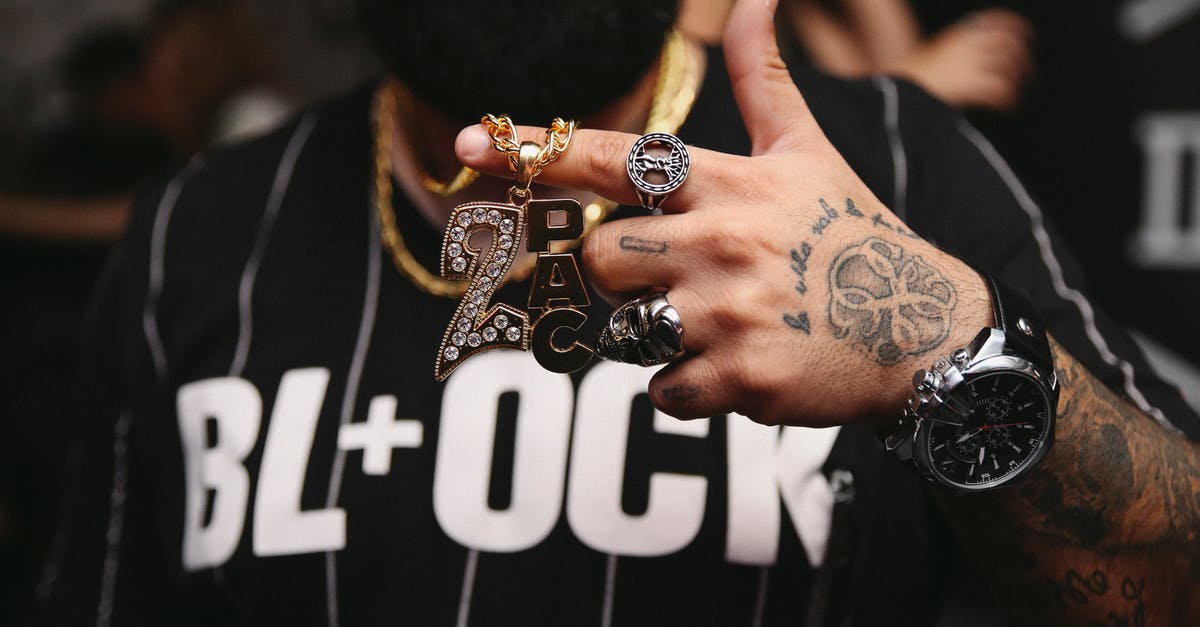 Why can't I identify some staves/rings in Rogue? - Man in Black and White Shirt With Tattoo on His Left Hand