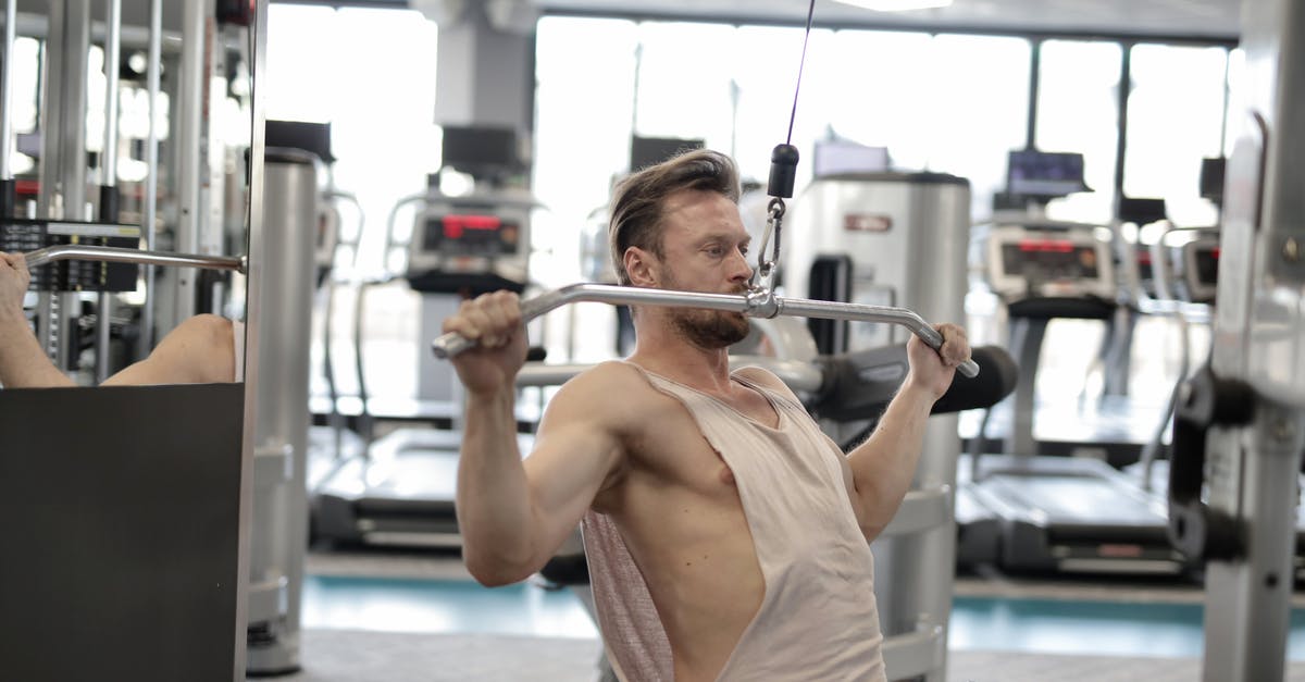 Why can't I log back in to my Training Club Account on Pokemon Go? - Powerful muscular male athlete in casual sportswear performing exercise with metal bar on machine while training hard in modern fitness club Why can't I log back in to my Training Club Account on Pokemon Go? - Powerful muscular male athlete in casual sportswear performing exercise with metal bar on machine while training hard in modern fitness club