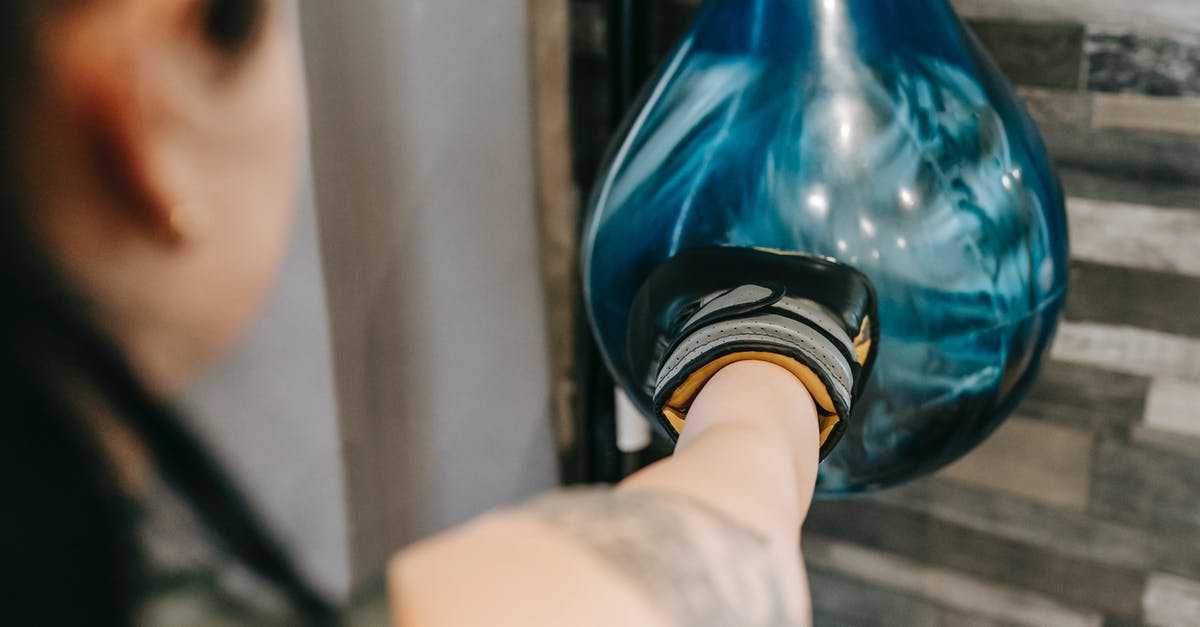 Why can't I log back in to my Training Club Account on Pokemon Go? - Woman punching heavy boxing bag during training Why can't I log back in to my Training Club Account on Pokemon Go? - Woman punching heavy boxing bag during training