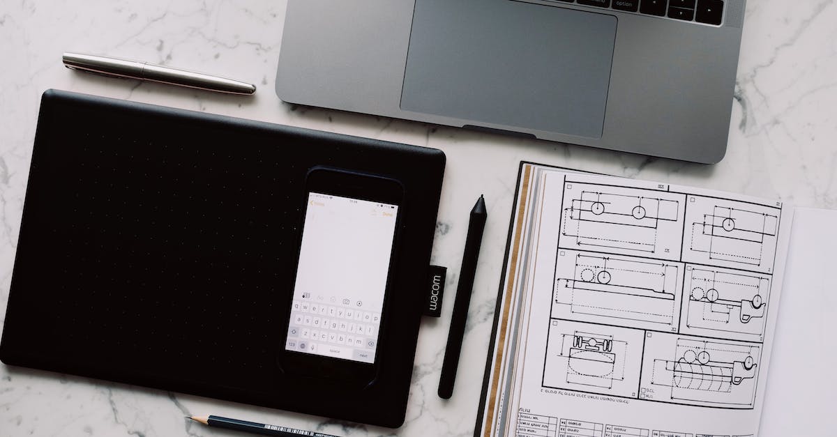 why can't I open my commands or chat - Opened laptop and smartphone near book with scheme