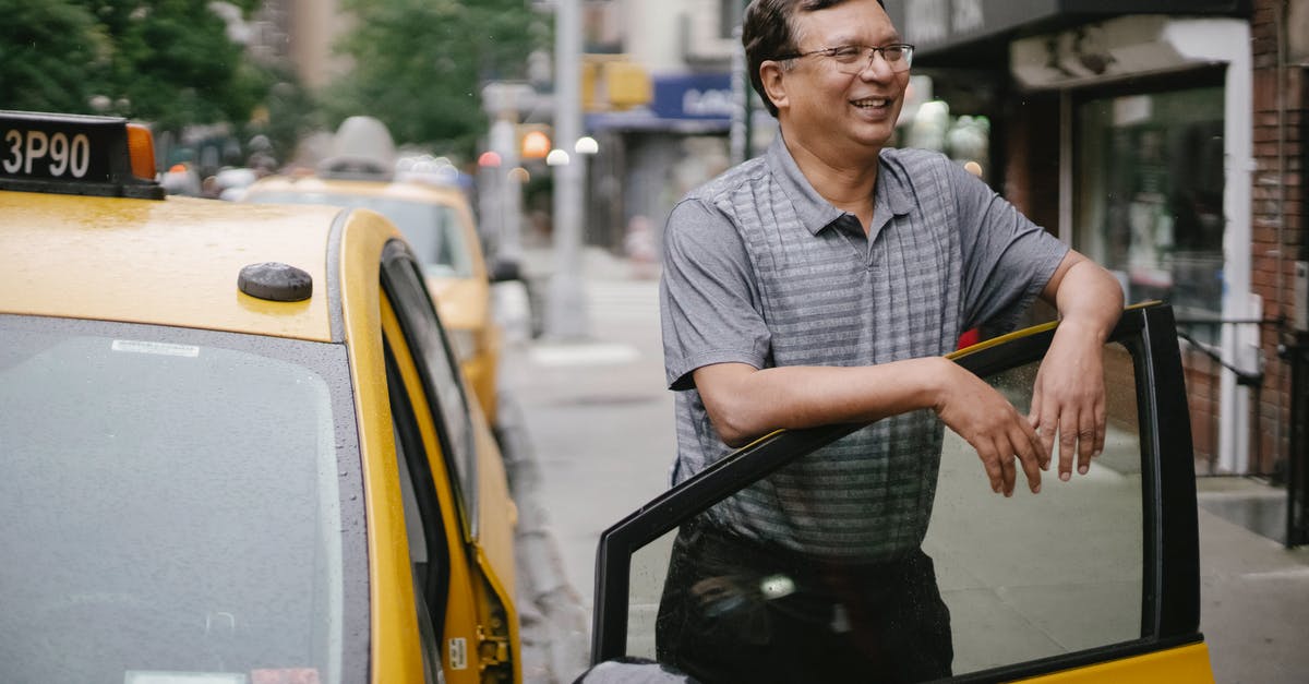 Why can't I see the amount of troops in an enemy town sometimes in HoMM 3? - Happy man with glasses smiling and standing near yellow taxi on street in city in daytime Why can't I see the amount of troops in an enemy town sometimes in HoMM 3? - Happy man with glasses smiling and standing near yellow taxi on street in city in daytime