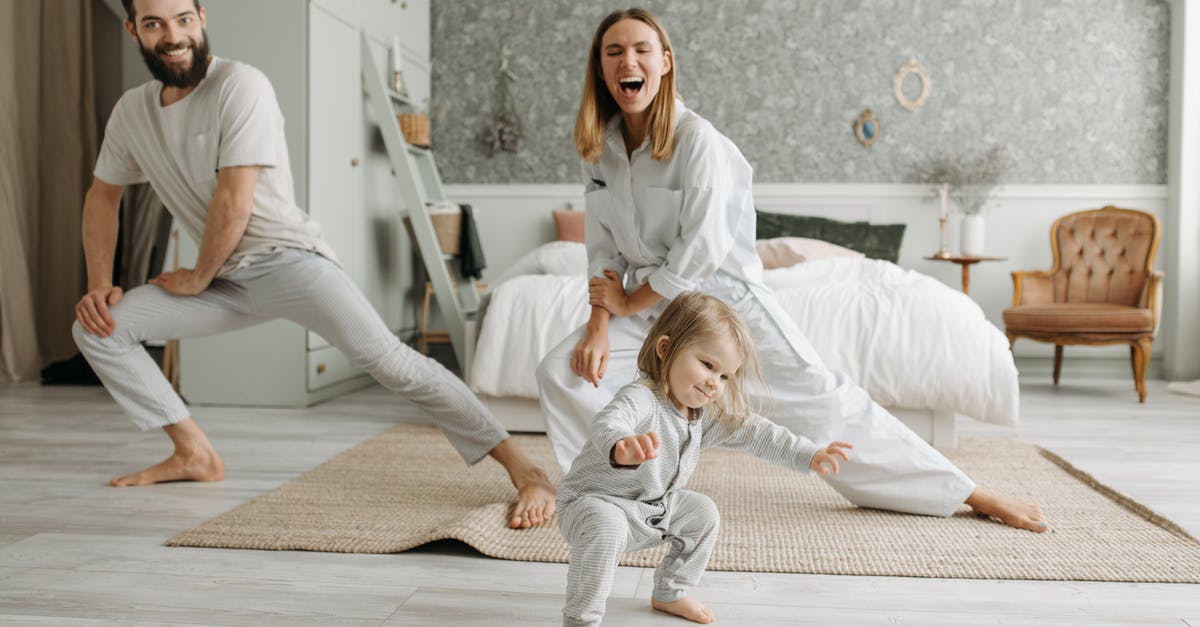 Why can't I spend time in bed? - Woman in White Scrub Suit Sitting on Floor Beside Girl in White Dress Why can't I spend time in bed? - Woman in White Scrub Suit Sitting on Floor Beside Girl in White Dress