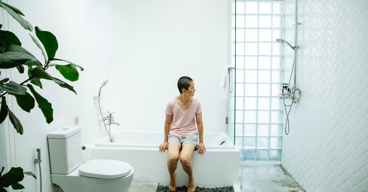 Why can't I tap Pokémon on the map? - Lady sitting on bath near toilet and shower Why can't I tap Pokémon on the map? - Lady sitting on bath near toilet and shower