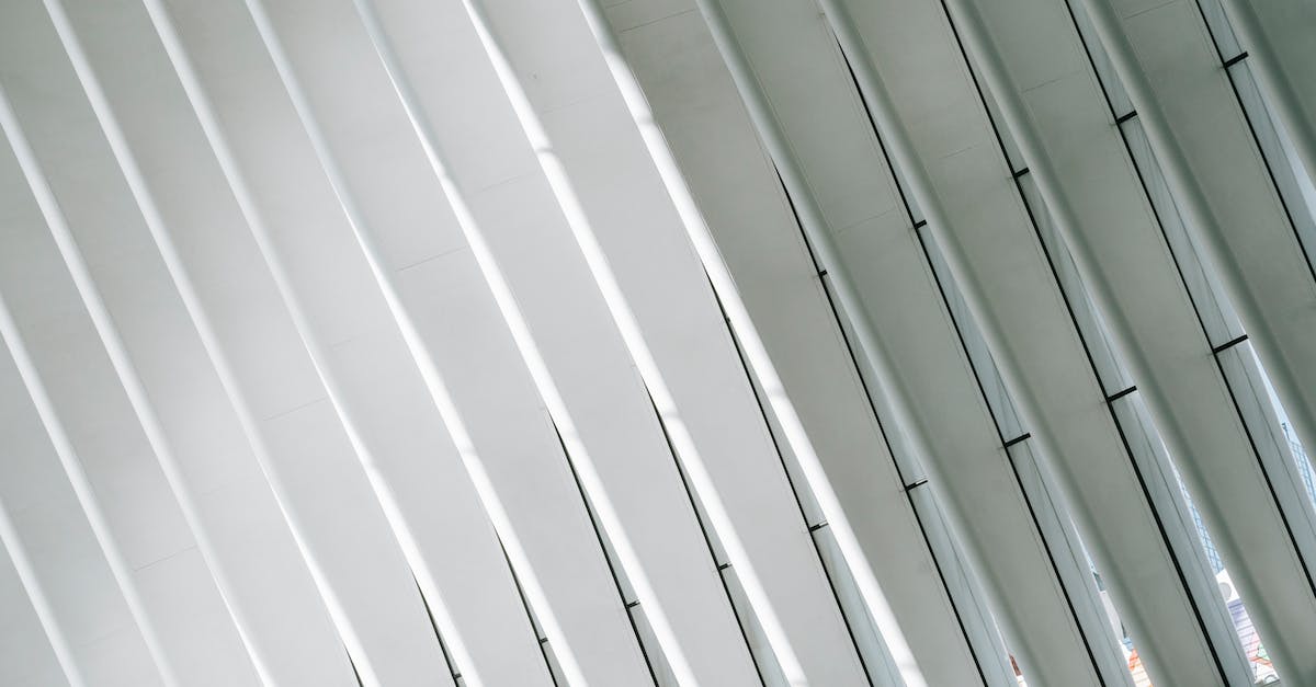 Why can't I use my reactor terminal in space engineers? - Low angle of geometric white walls with ribs and glass windows in modern minimalist building of terminal in New York