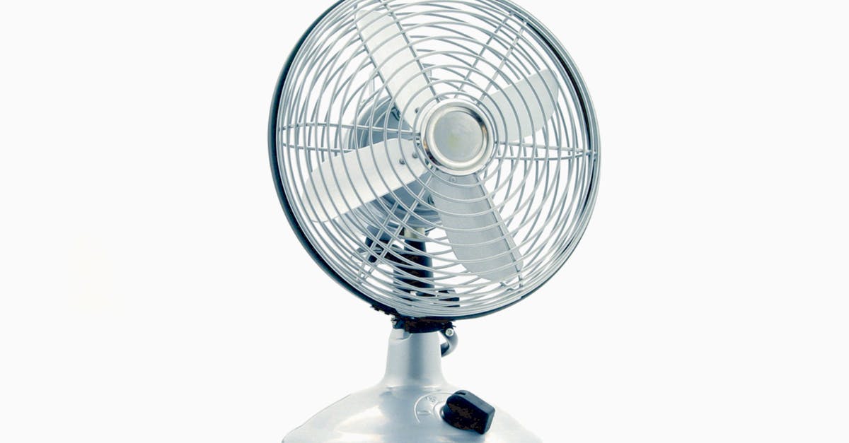 Why did all my cool power armors turn into rusty T-45's? - White Desk Fan on White Table