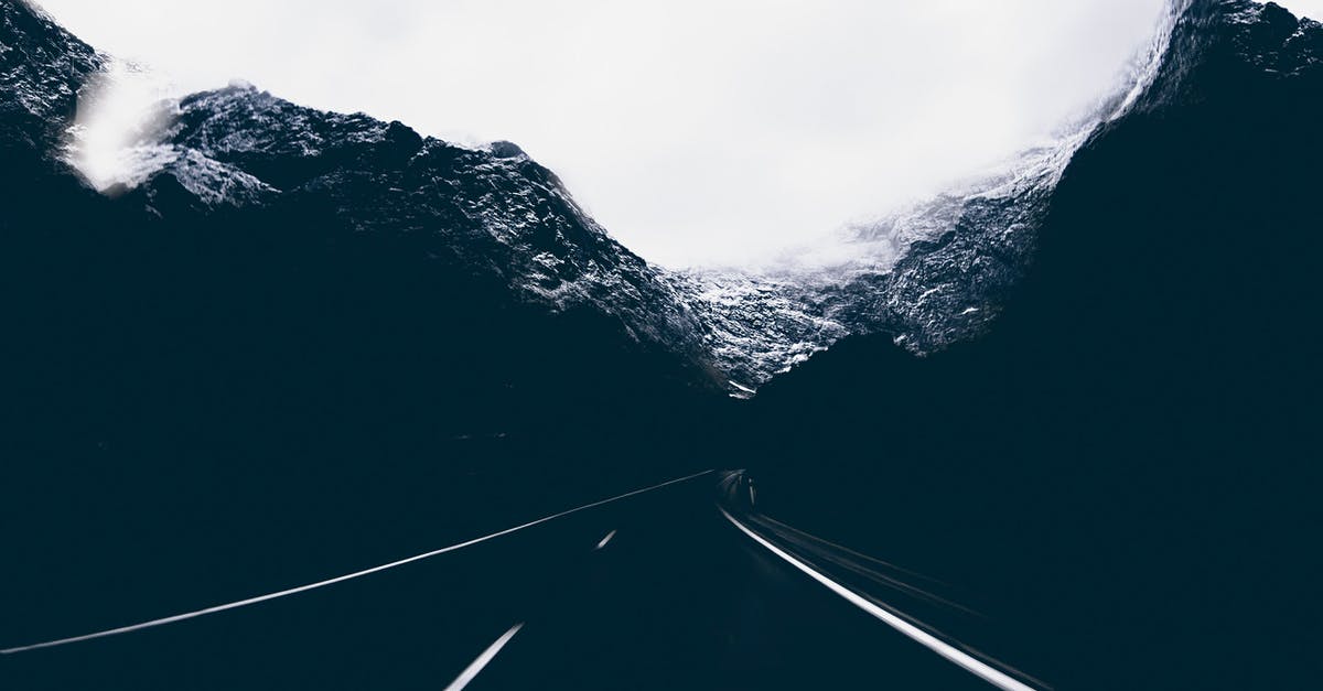 Why did Cloud gave the Black Materia to Sephiroth twice? - Landscape Photo of Road in the Middle of Mountains