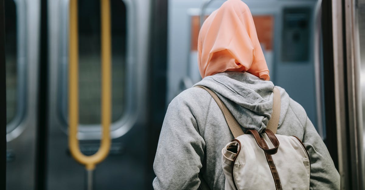 Why did my train choose the blocked path at the junction? - Woman with backpack in subway Why did my train choose the blocked path at the junction? - Woman with backpack in subway