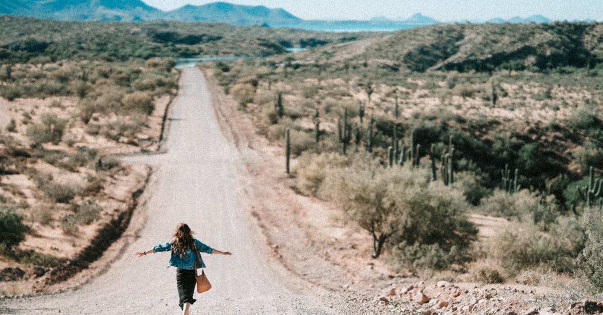 Why did my wasteland explorers trade out their weapons? - Woman Walking on Dirt Road Why did my wasteland explorers trade out their weapons? - Woman Walking on Dirt Road