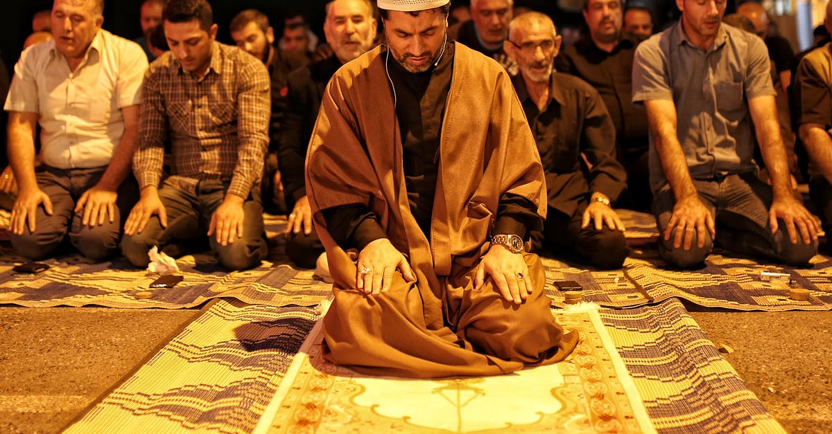 Why did the Thalmor decide that the Talos worship should be banned - Group of Men Sitting on Floor