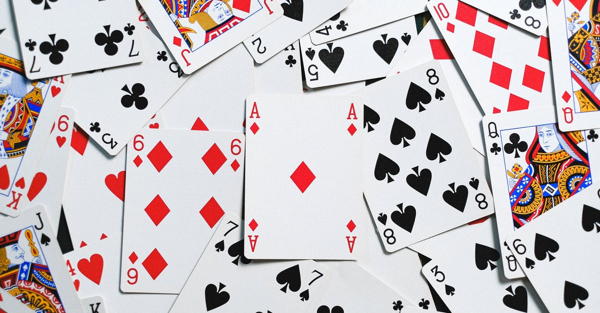Why didn't Batman just knock down the Joker while he had the chance? - Photo of Scattered Playing Cards Why didn't Batman just knock down the Joker while he had the chance? - Photo of Scattered Playing Cards