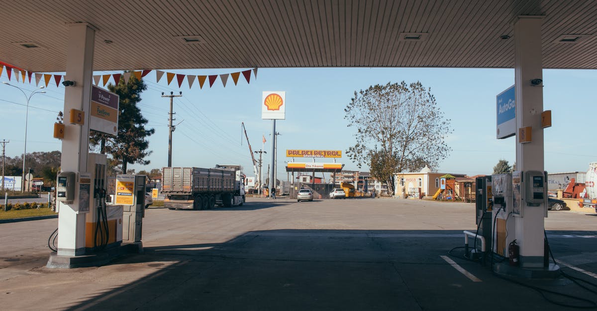 Why do higher CP Pokemon cost less stardust to power up? - Empty gas station with oil petrol dispensers located on highway for serving long distance vehicles