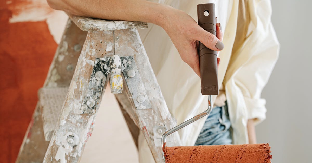 Why do mobs spawn in my house? - Close-Up Shot of a Person Holding a Paint Roller with Brown Paint Why do mobs spawn in my house? - Close-Up Shot of a Person Holding a Paint Roller with Brown Paint