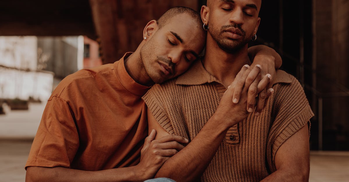Why do my NPCs love each other? [closed] - Couple Sitting and Holding Hands and Arms Around Each Other 