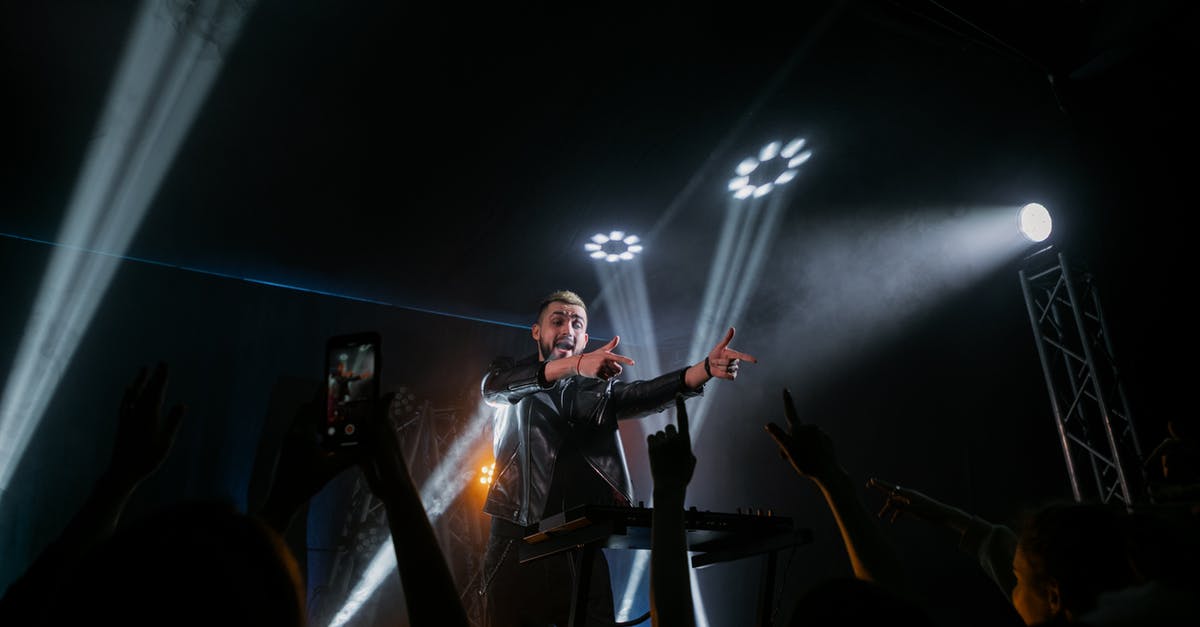 Why do perfect run scores in the same stage vary so much? - Man in Black Suit Singing on Stage
